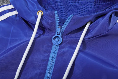 Lyon's blue hooded windbreaker
