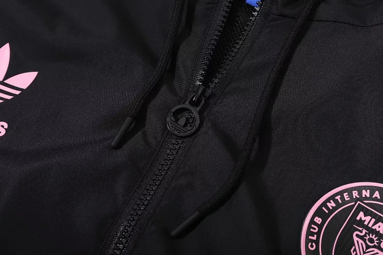 Miami black hooded trench coat.
