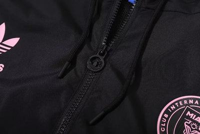 Miami black hooded trench coat.