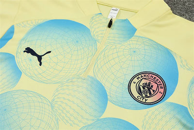 2024/25 Manchester City light yellow long sleeve training kit.