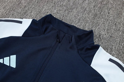 2024/25 Real Madrid blue jacket.