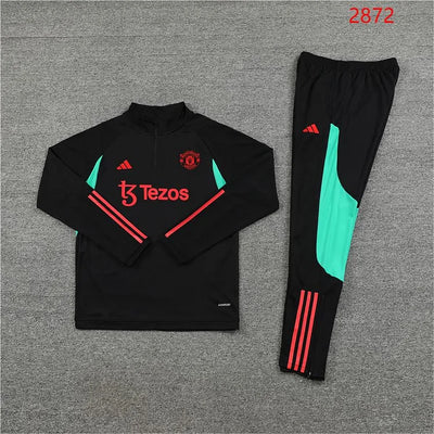 2023/24 Manchester United Half-Zip Long Sleeve Training Kit.