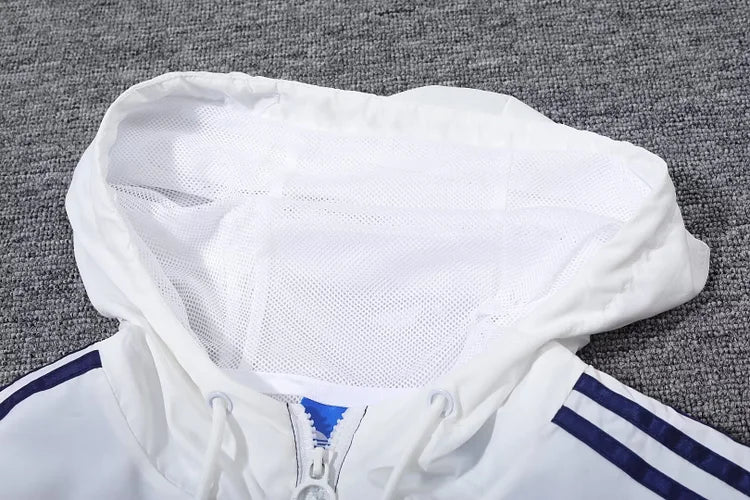 Real Madrid blue and white hooded windbreaker
