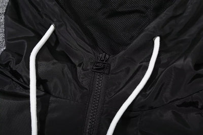 Paris black hooded trench coat.