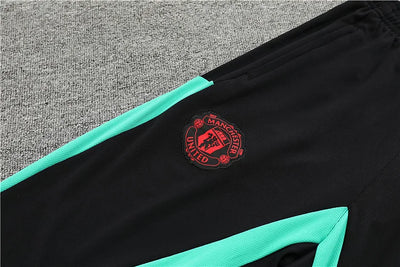 2023/24 Manchester United Half-Zip Long Sleeve Training Kit.