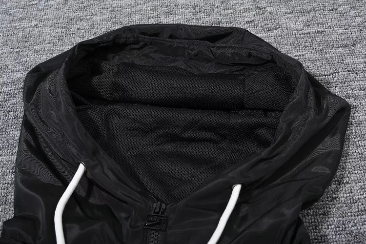 Paris black hooded trench coat.