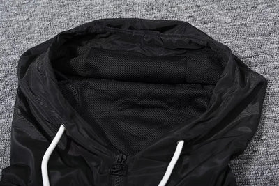 Paris black hooded trench coat.