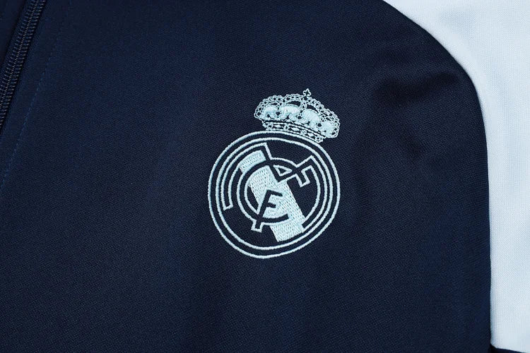 2024/25 Real Madrid blue jacket.