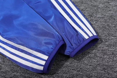 Lyon's blue hooded windbreaker