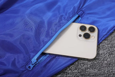 Lyon's blue hooded windbreaker