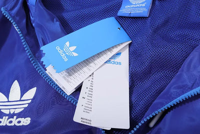 Lyon's blue hooded windbreaker