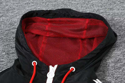 Flamenco red hooded trench coat.