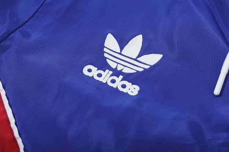 Lyon's blue hooded windbreaker