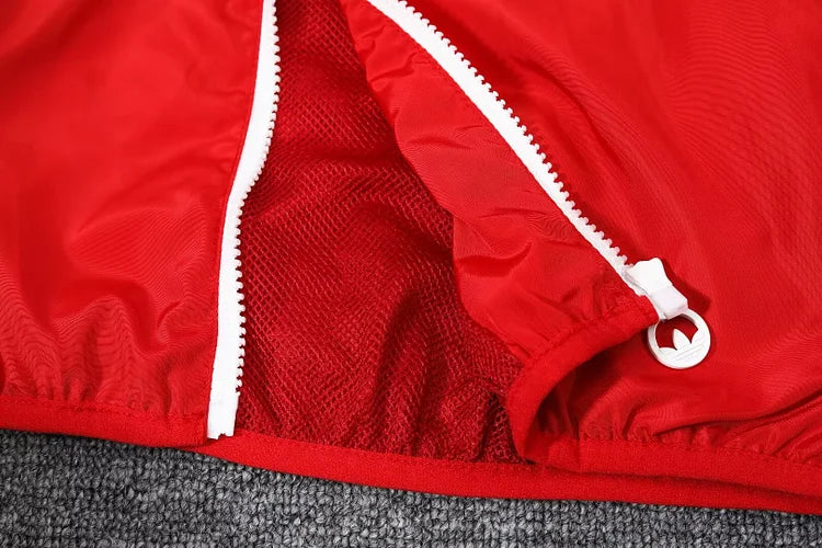 Flamenco red hooded trench coat.