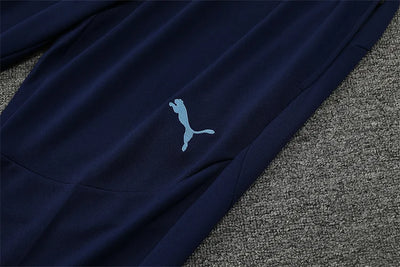 2024/25 Manchester City light yellow long sleeve training kit.