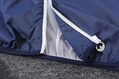 Real Madrid blue and white hooded windbreaker