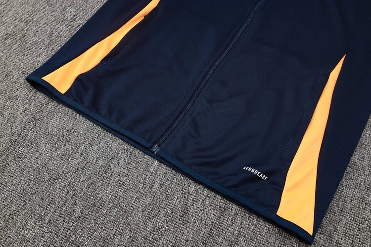 2024/25 Real Madrid blue jacket.