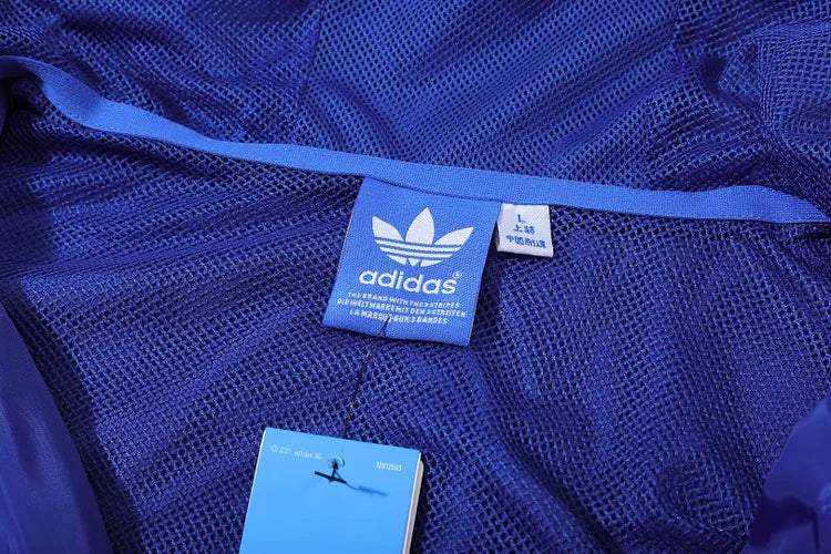 Lyon's blue hooded windbreaker