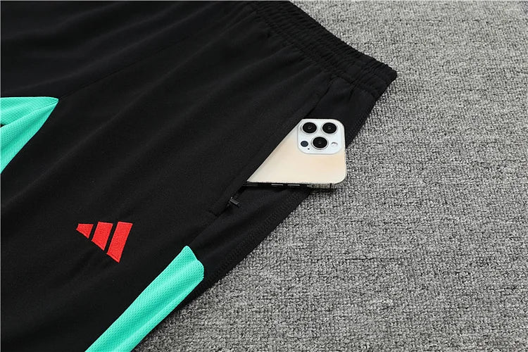 2023/24 Manchester United Half-Zip Long Sleeve Training Kit.