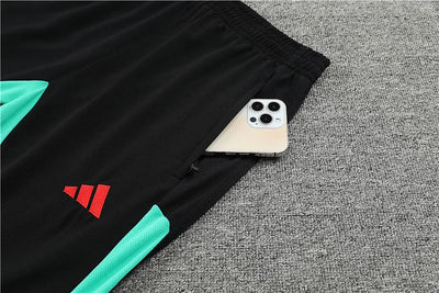 2023/24 Manchester United Half-Zip Long Sleeve Training Kit.