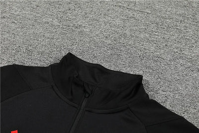 2023/24 Manchester United Half-Zip Long Sleeve Training Kit.