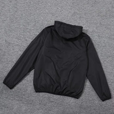 Miami black hooded trench coat.