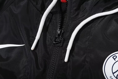 Paris black hooded trench coat.