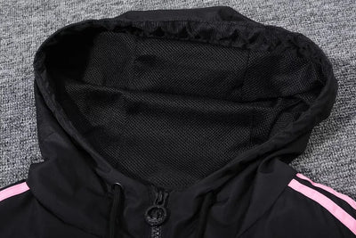 Miami black hooded trench coat.